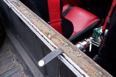 1972 Ford Ranchero - Interior view of a vehicle with racing seats and a fire extinguisher visible.