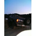 1993 Ford Bronco - Rear view of a 1993 Ford Bronco parked outdoors during twilight.