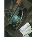 1993 Ford Bronco - A circular gauge and some documents are visible inside a cardboard box.