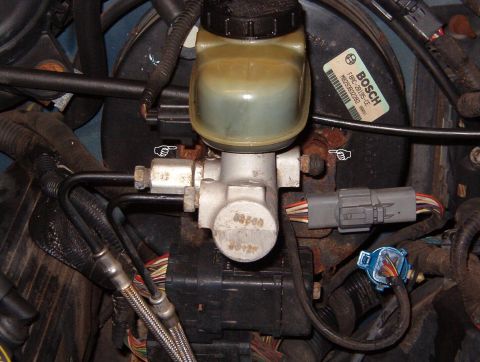 1999 Ford Crown Victoria - To start, remove the 2 nuts holding the master cylinder to the booster. The R one is very difficult to get to because of the residual press…