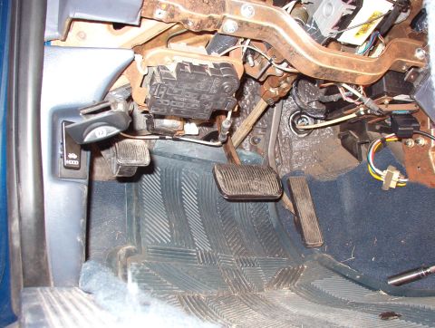 1999 Ford Crown Victoria - It might be possible to make the swap without doing this, but I removed the knee bolster for easier access under the dash.