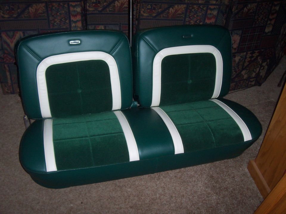 Green and white upholstered bench seat with two sections