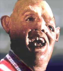 1992 Ford Taurus - A character's face is shown in a close-up, with a Supermotors logo visible.