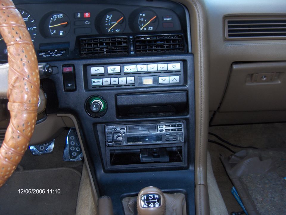 Toyota Supra interior with tan trim, Sony cassette deck and 5-speed manual shifter