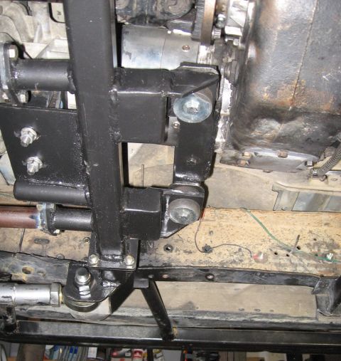 1994 Ford Bronco - Custom crossmember assembly installed on the underbody of a vehicle, near the transmission.