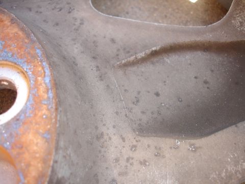 1993 Ford Taurus - This image shows a close-up of a worn brake rotor, not a 1993 Ford Taurus.