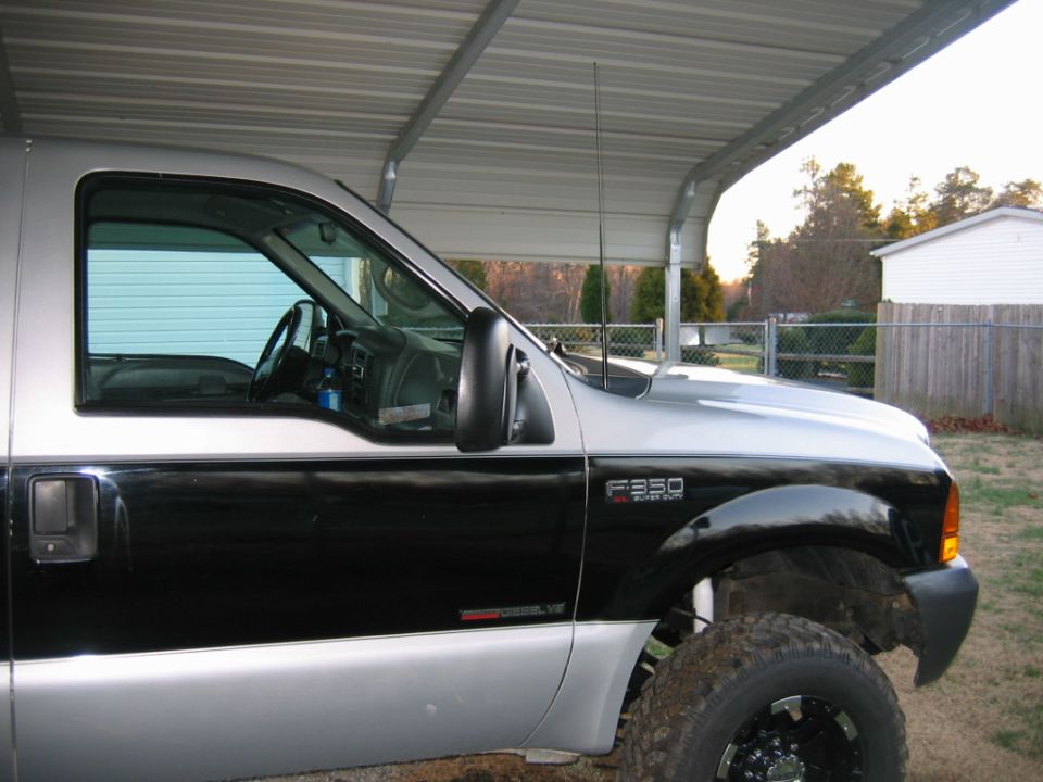 Silver and black Ford F-350 Super Duty side view