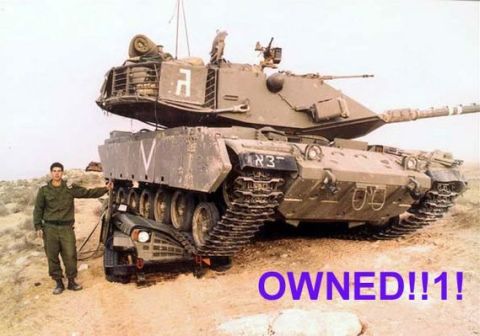 1995 Ford Bronco - A military tank is shown crushing a car, with a soldier posing next to the scene.