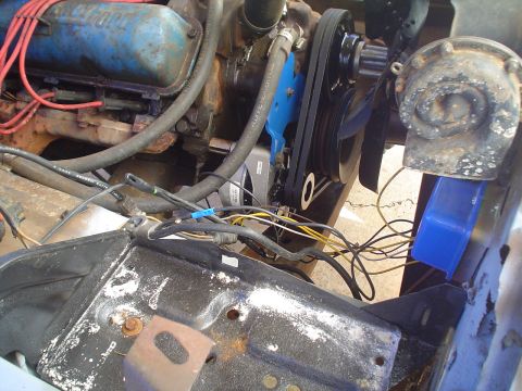 1967 Ford F-250 - Engine bay detail with visible Ford V8 engine components and wiring harness.