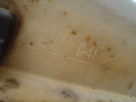 1967 Ford F-250 - Stamped text on a cream-colored part reads PAINT CK C-4.