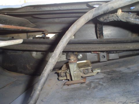 1984 Ford Bronco - Tailgate latch mechanism detail, likely from an older vehicle.