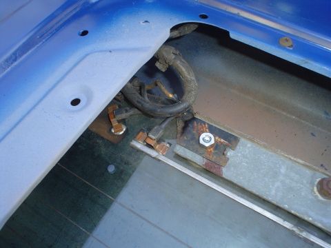 1984 Ford Bronco - Wiring connections and mounting hardware are visible on the tailgate of a vehicle.