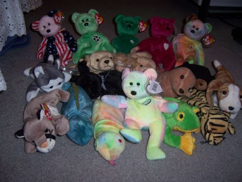 1987 Volkswagen Golf - A variety of stuffed animals are scattered on a carpeted surface.