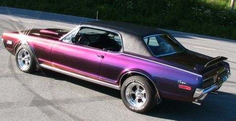1968 Mercury Cougar - This 1968 Mercury Cougar has a custom purple paint job and a black vinyl top.