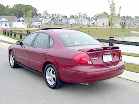 2002 Ford Taurus - This 2002 Ford Taurus sedan is shown from the rear 3/4 angle.
