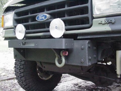 1991 Ford Bronco - Front view of a 1991 Ford Bronco, its grille and heavy-duty bumper with a tow hook.