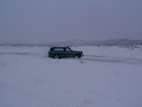 2003 Ford Ranger - SUV stuck in snow during a winter outing.