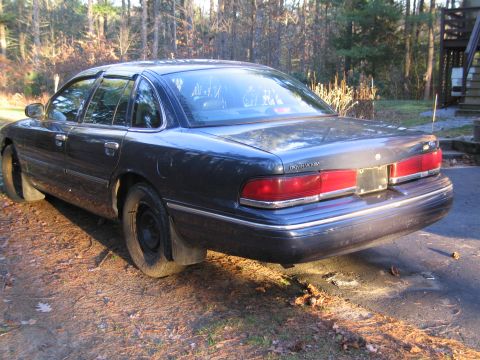 1991 Ford LTD Crown Victoria - Rear view of a 1991 Ford Crown Victoria LTD sedan parked outside.