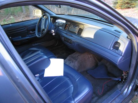 1991 Ford LTD Crown Victoria - Interior view of a 1991 Ford Crown Victoria LTD, showing the dashboard and seats.