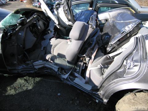1991 Ford LTD Crown Victoria - Interior view of a severely damaged 1991 Ford Crown Victoria LTD after a collision.