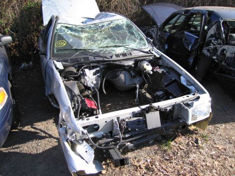 1991 Ford LTD Crown Victoria - This 1991 Ford Crown Victoria LTD has significant front-end damage and a broken windshield.