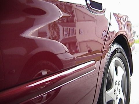 2002 Ford Taurus - This reflection pic just DOES NOT do it justice :)