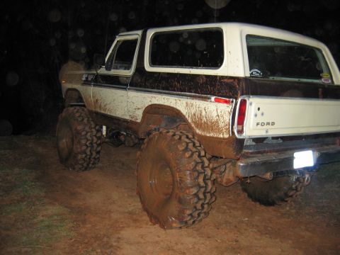1992 Ford Mustang - This lifted 1978 Ford Bronco is covered in mud, suggesting off-road use.