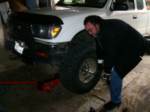 1993 Ford Bronco - Tony loosening lug nuts