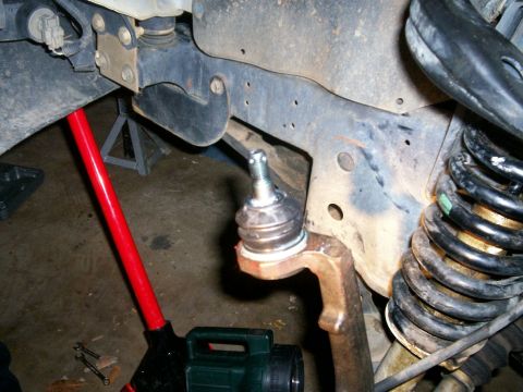 1993 Ford Bronco - New upper ball joint boot slipped on after filling it with supplied grease.