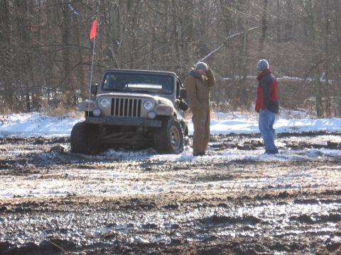 1979 Ford Bronco - Off-roading in the mud and snow with a Jeep Wrangler.