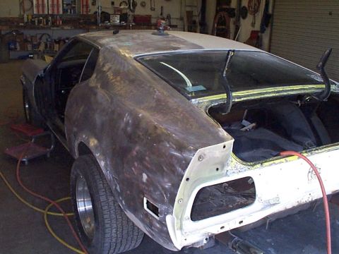 1971 Ford Mustang - The car had so many layers of paint on it that it had to be taken down to bare metal.