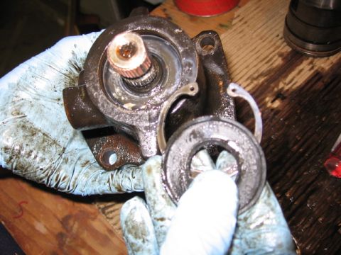 1989 Ford Bronco - Remove the dust shield and clip.