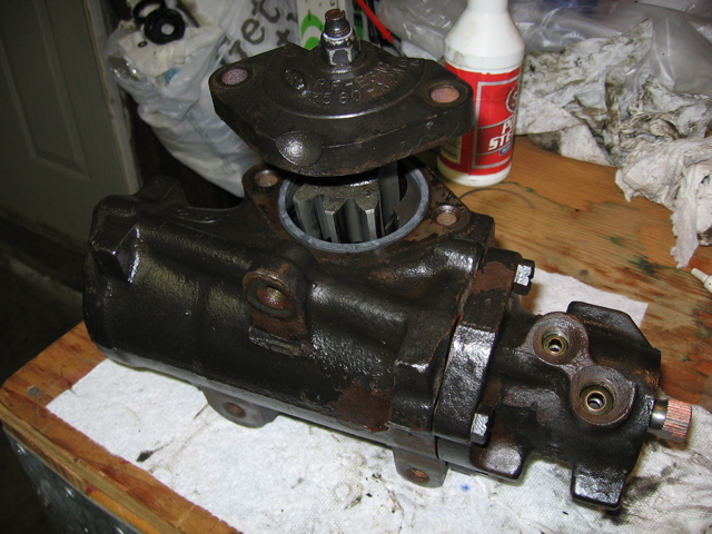 Installing the sector shaft. Lube the gears with a little clean power steering fluid to easy this assembly.