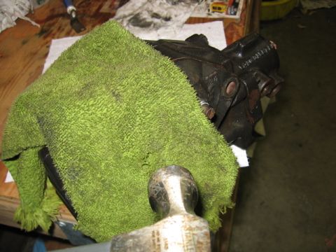 1989 Ford Bronco - Don't have a rubber mallet? No sweat! Use a old towels double over to soften the blows. Warning this destroys your towels.