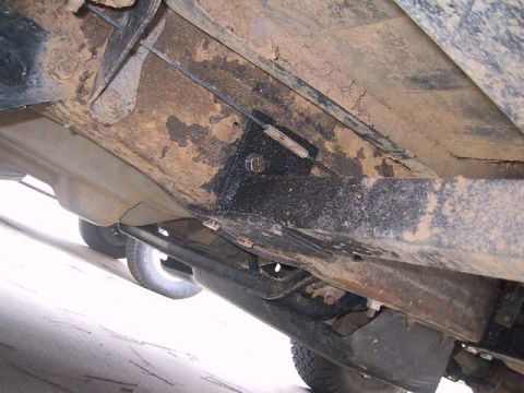 1995 Ford Bronco - Underside view of vehicle frame and suspension components, with Supermotors.net logo.