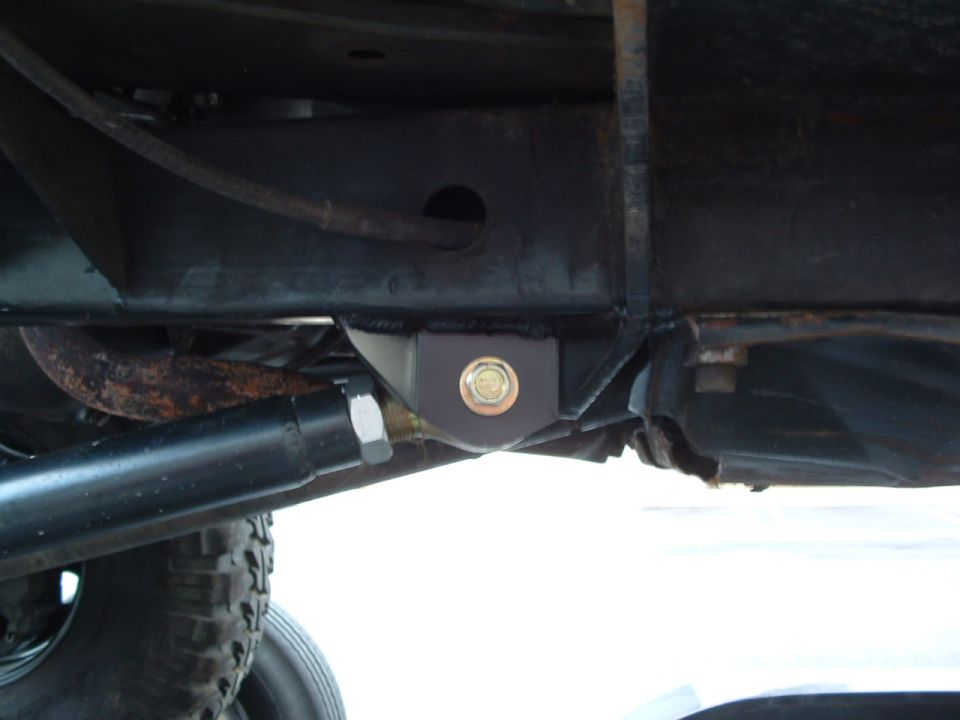 1994 Jeep YJ frame with suspension linkage and tire visible
