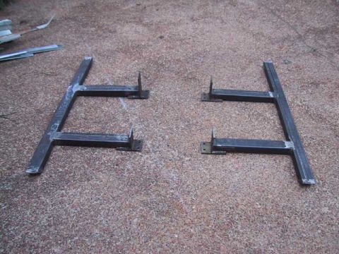 1995 Ford Bronco - Pair of custom fabricated metal sliders for an off-road vehicle.