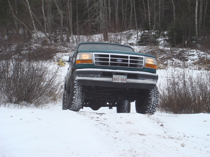 1996 Ford Bronco front view in snowy terrain