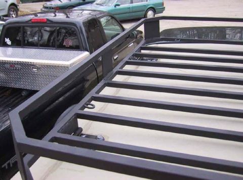 1995 Ford Bronco - Custom roof rack installed on a pickup truck bed, with a toolbox in the background.