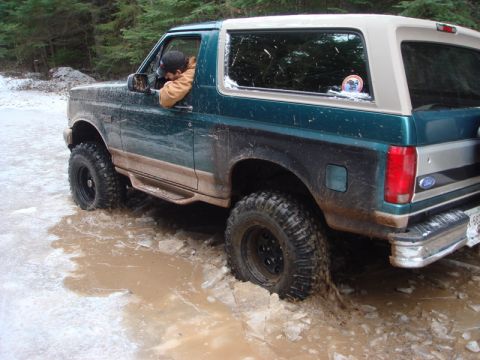1996 Ford Bronco - This 1996 Ford Bronco is stuck in a muddy, icy patch off-road.
