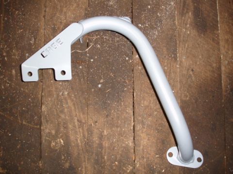 1996 Ford Bronco - A single piece of a roll cage, labeled 'CAGE', is shown against a rustic wooden background.
