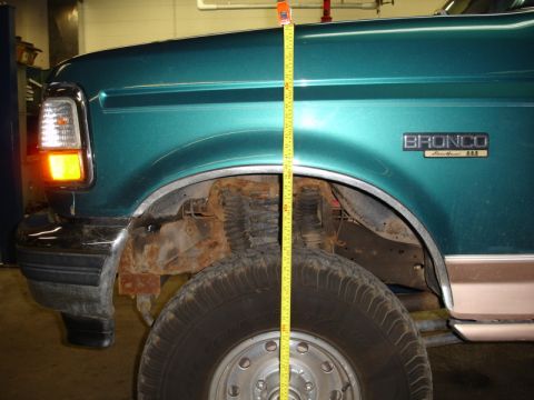 1996 Ford Bronco - Front suspension height measurement on a 1996 Ford Bronco.