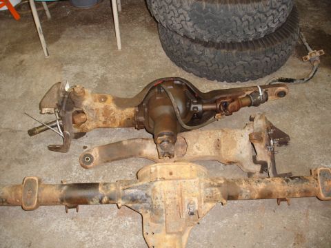 1996 Ford Bronco - Two Ford Bronco rear axle assemblies are shown, likely for repair or replacement.
