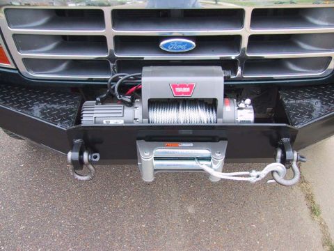 1995 Ford Bronco - Custom winch bumper with Warn winch installed on a Ford truck.