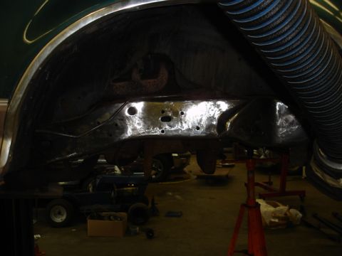 1996 Ford Bronco - Underside view of vehicle frame and suspension components during a build or repair.