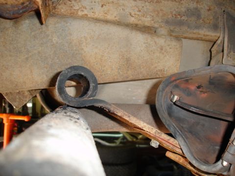 1996 Ford Bronco - Leaf spring and rubber bushing detail, likely from a vehicle's suspension system.