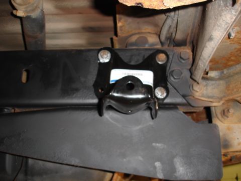 1996 Ford Bronco - A close-up view of a vehicle's undercarriage, focusing on a newly installed suspension component.