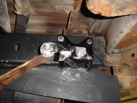 1996 Ford Bronco - A detailed view of a newly installed suspension component on the undercarriage of a vehicle.