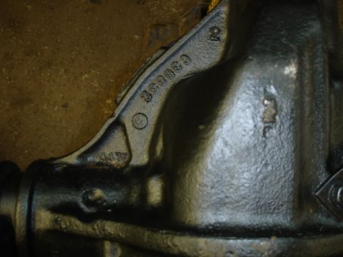 1996 Ford Bronco - Close-up of a cast iron differential housing showing stamped part numbers.