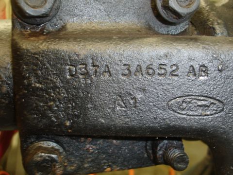 1996 Ford Bronco - This close-up shows a Ford part with casting numbers D3TA 3A652 AB and the Ford logo stamped into the metal.